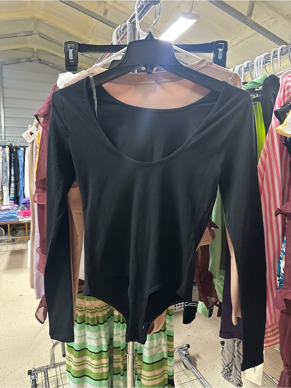 2 XXS NEW IN PACKAGE BODYSUITS